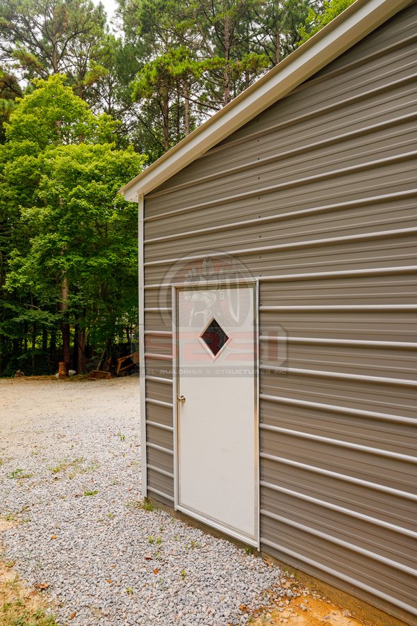 side view of 2 bay garage with door