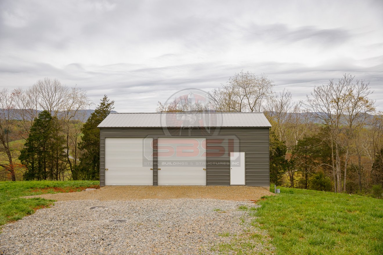 Custom garage with 2 bays and side door