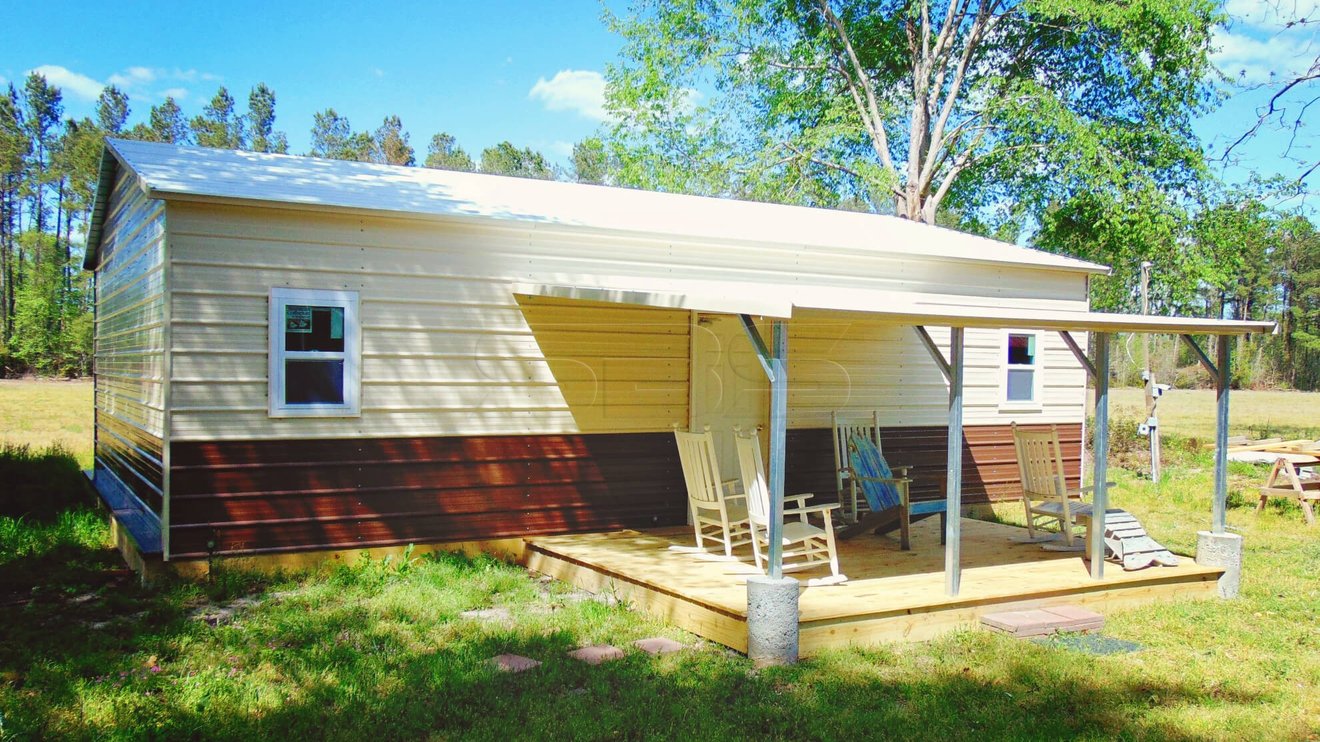 custom designed metal building with covered front porch