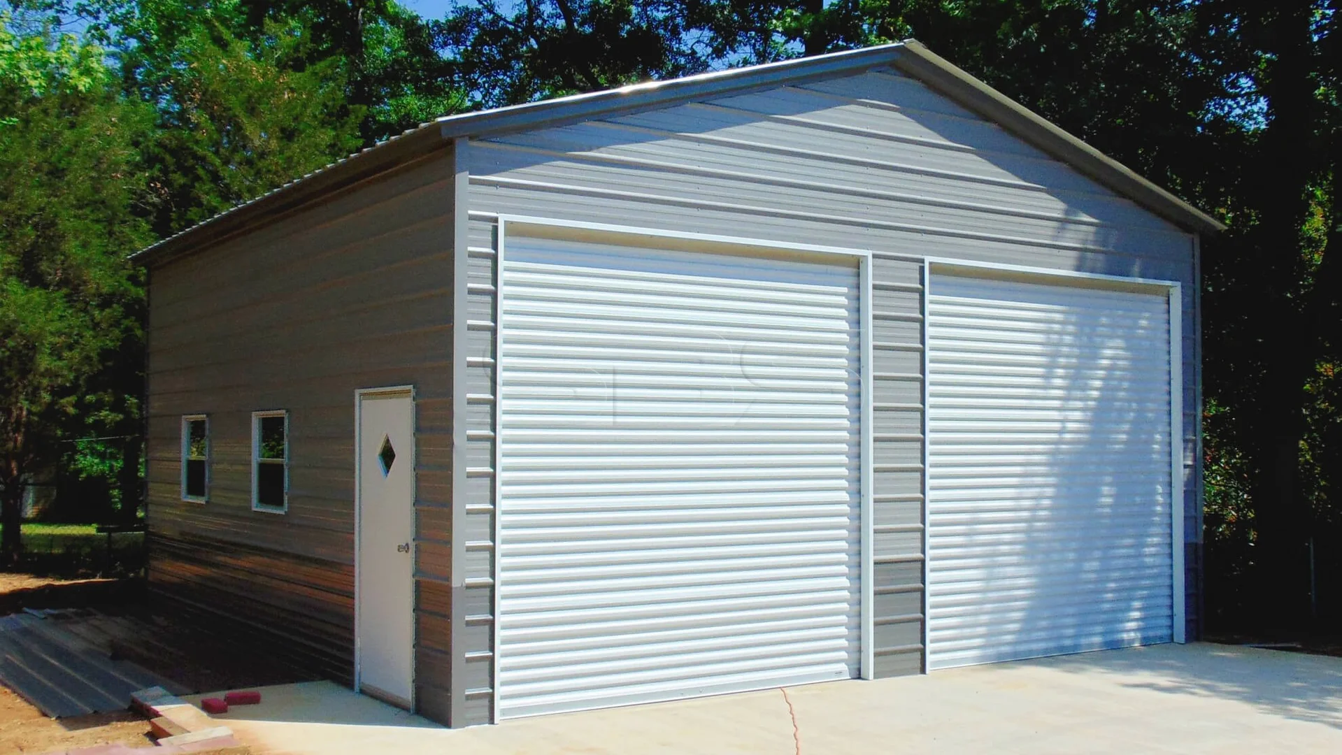 24 x 26 x 12 custom building with two garage doors