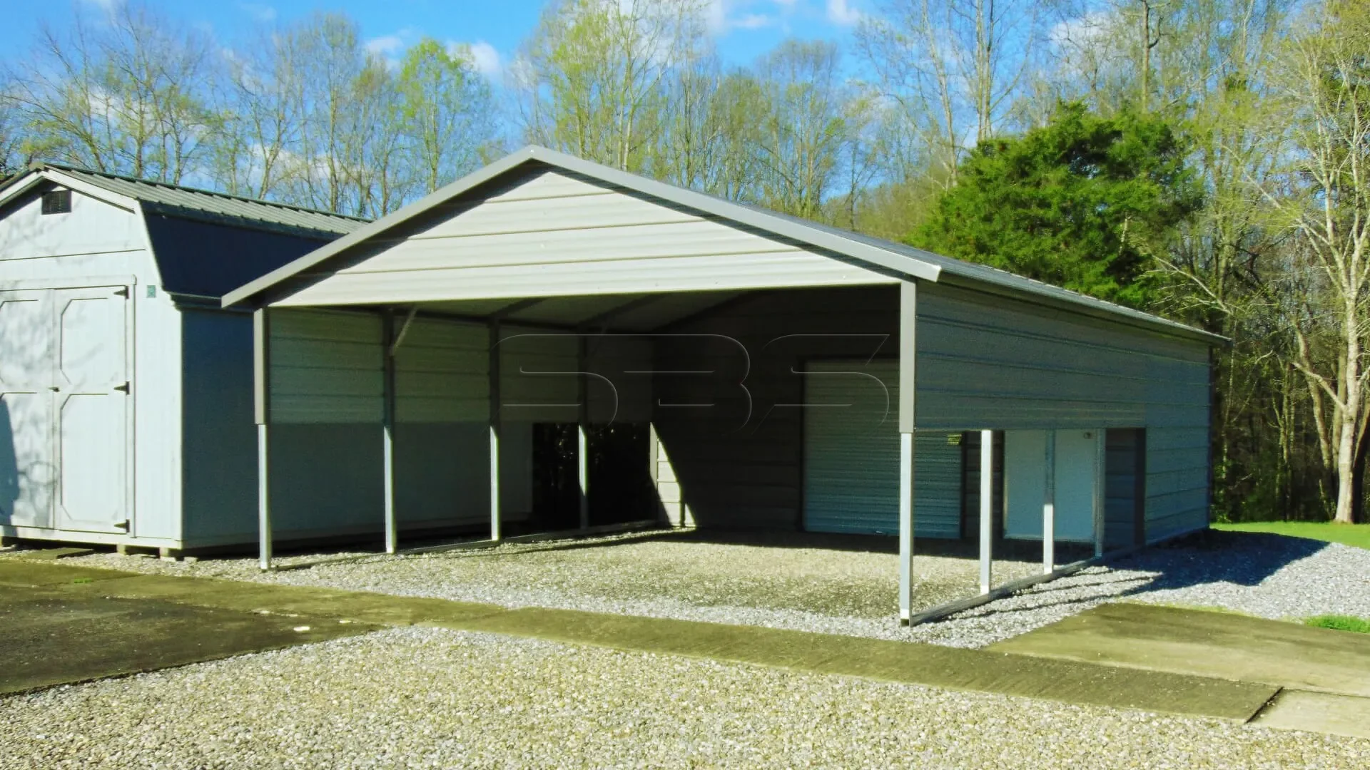 Boxed eave metal carport with storage room